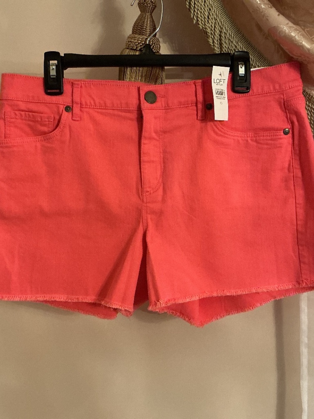 Loft 4” women”s shorts mid rise 98% cotton, 2% spandex. Size 10, coral color.